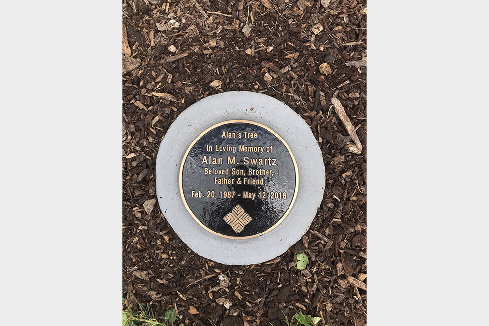 Circular bronze plaque for a forest preserve