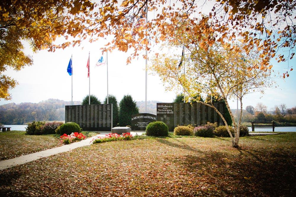 Far shot of Hillsboro Veterans Memorial beside fall backdrop