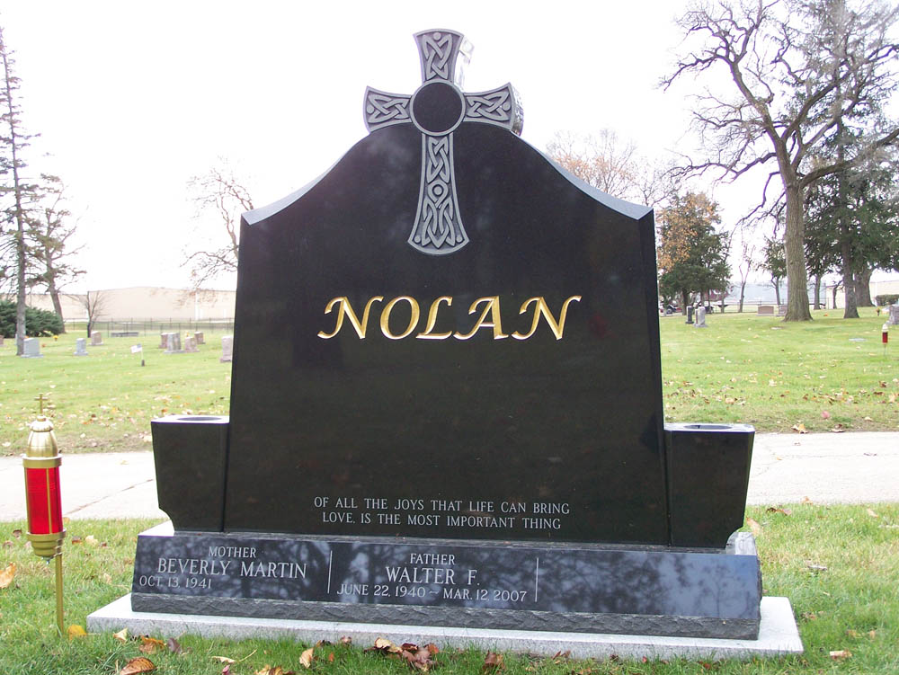 Family monument in black granite with Celtic cross