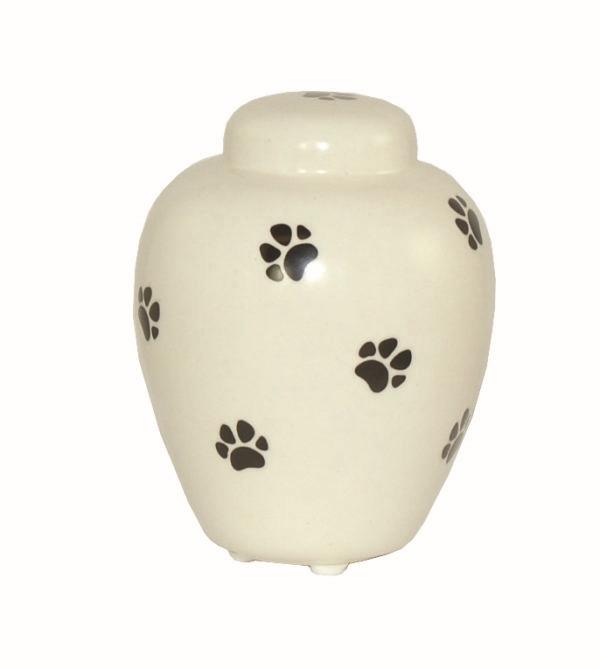 small ceramic urn with paws and lid